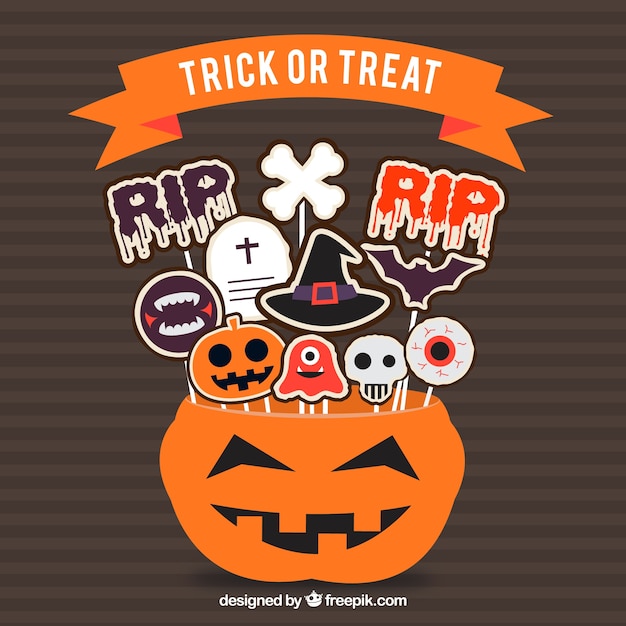 Vector gratuito calabaza con piruletas de halloween