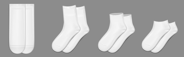 Calcetines blancos colocados aislados en el fondo