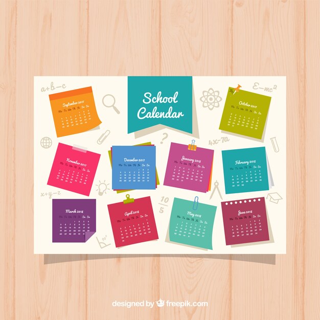 Calendario escolar colorido en hojas de libreta