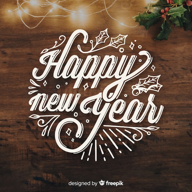 Vector gratuito caligrafía de año nuevo 2019