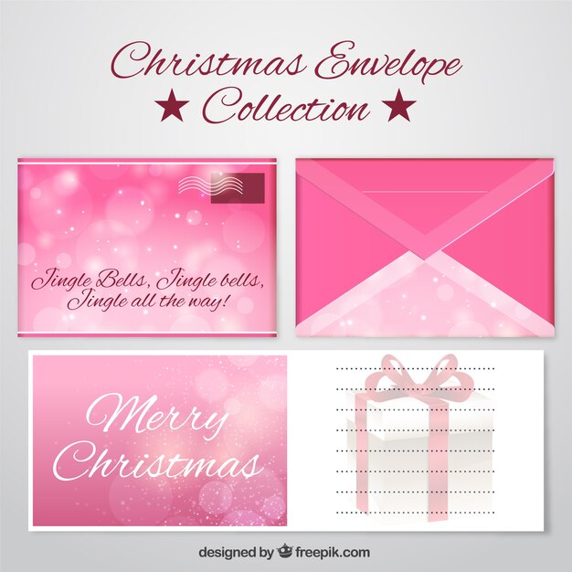 Cartas y sobres rosas brillantes de feliz navidad y año nuevo