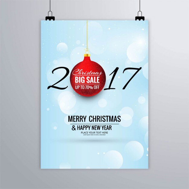 Cartel de año nuevo 2017 con bola de rebajas de navidad 