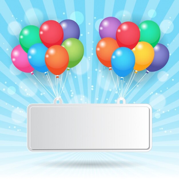 Cartel sujetado con globos de colores