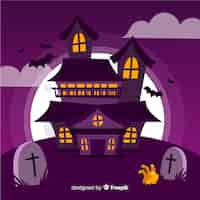 Vector gratuito casa de halloween en un cementerio y mano zombie