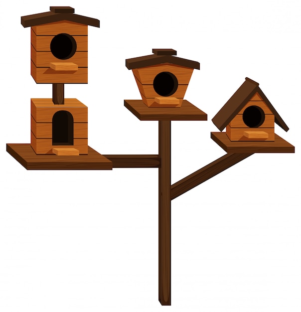 Casas de pájaros de madera en un poste