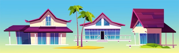 Casas de verano, bungalows en la playa, arquitectura hotelera tropical y palmeras.