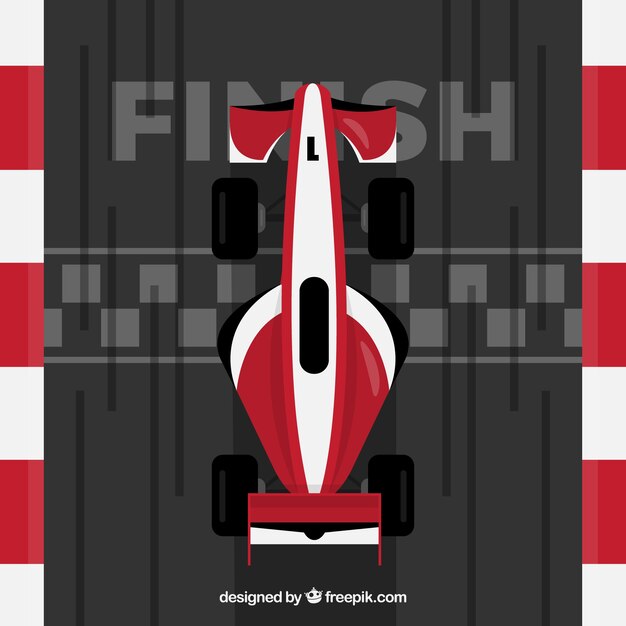 Coche de formula 1 rojo y blanco pasando línea de meta