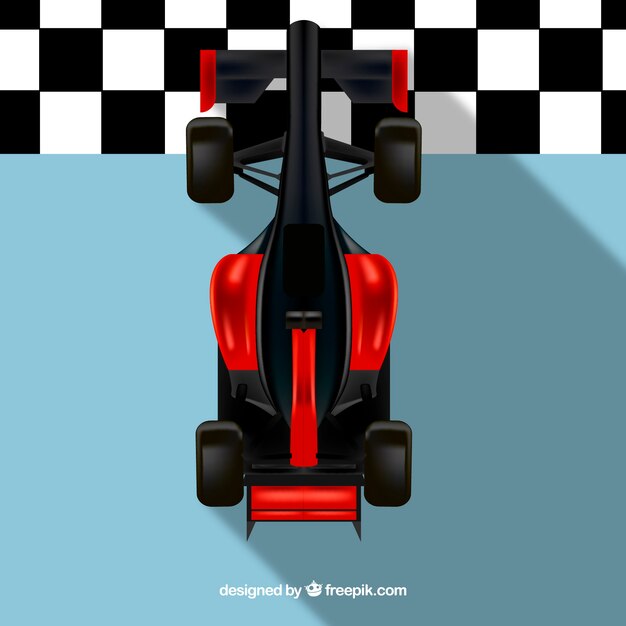 Coche de formula 1 rojo pasando línea de meta