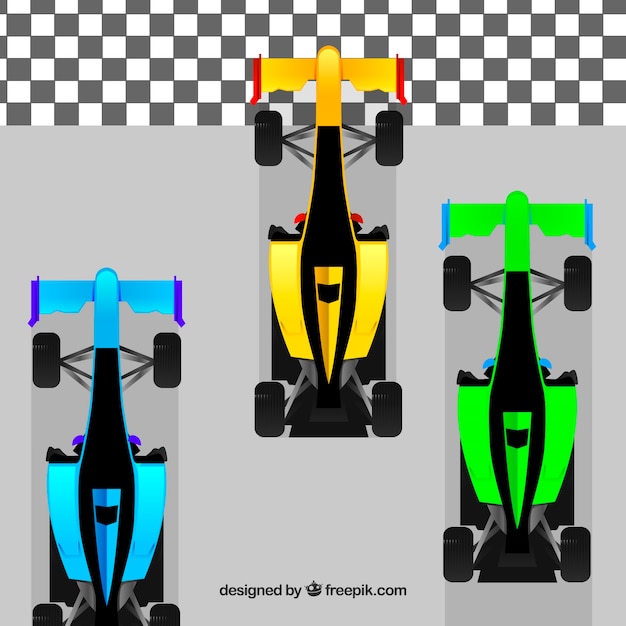 Coches de formula 1 de diferentes colores pasando línea de meta