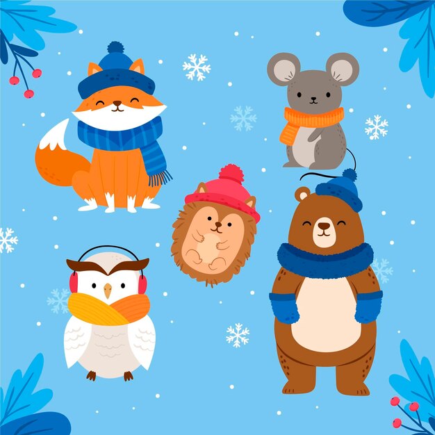 Colección de animales planos de invierno dibujados a mano