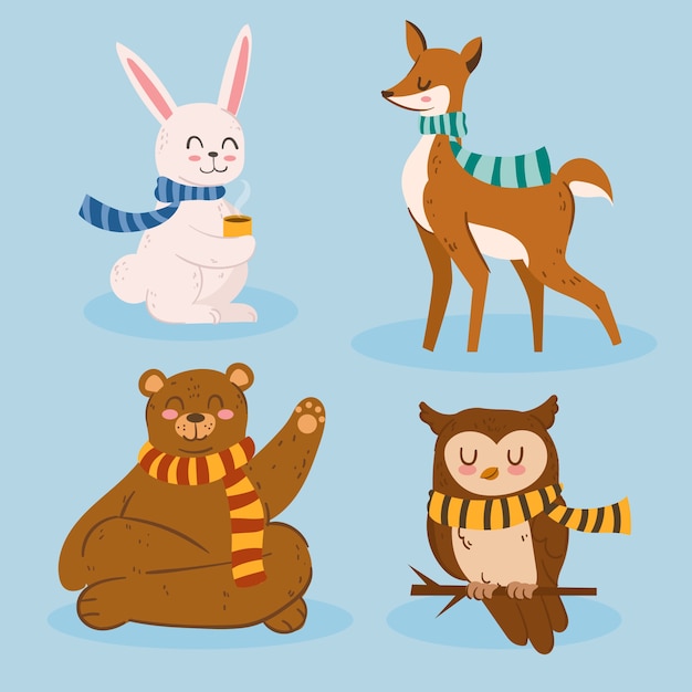 Colección de animales planos de invierno dibujados a mano