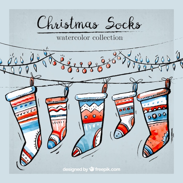 Vector gratuito colección de calcetines de navidad en acuarela