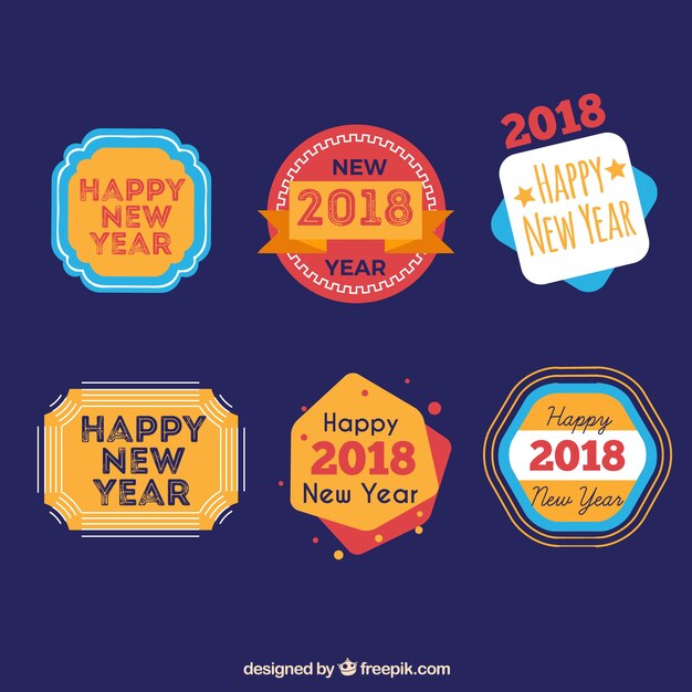 Colección de coloridas insignias vintage de año nuevo 2018