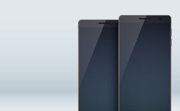 Colección de concepto de diseño moderno con dos elegantes teléfonos inteligentes negros con sombras en las grandes pantallas en blanco y pantallas táctiles en el gris