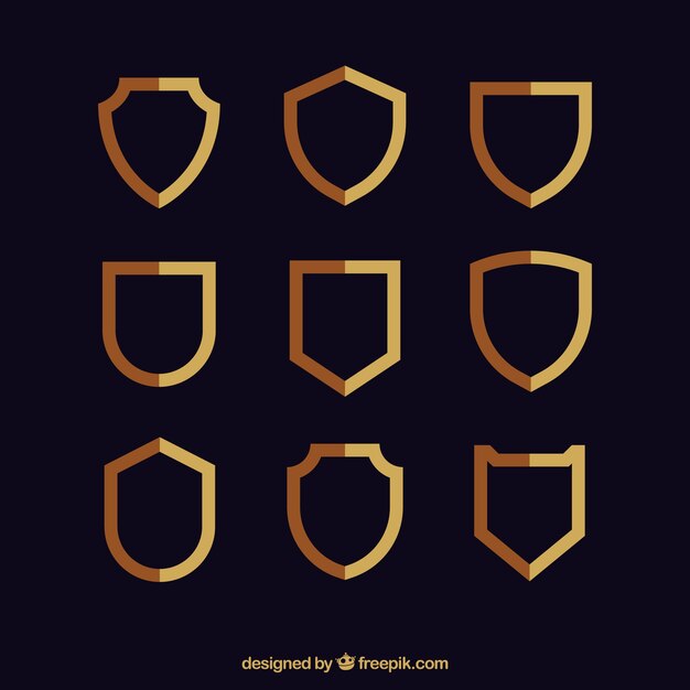 Colección de escudos dorados en diseño plano 