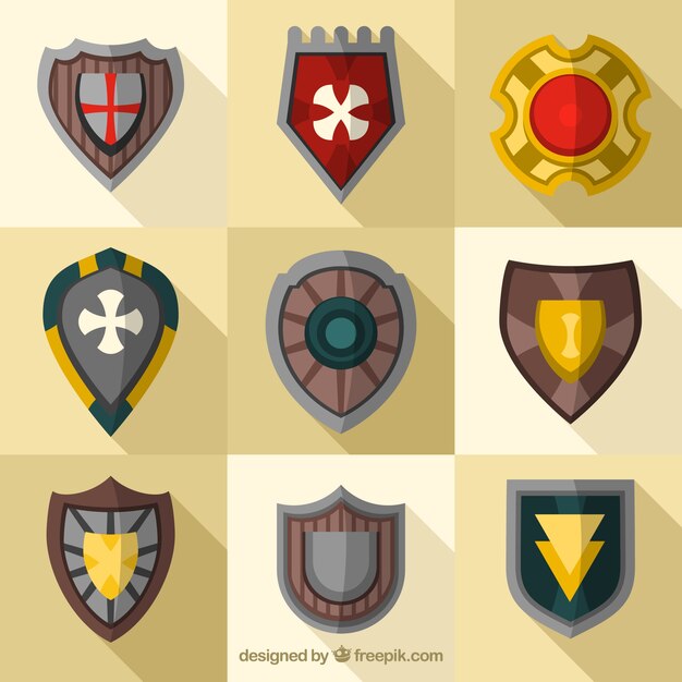 Colección de escudos medievales en diseño plano 