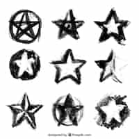 Vector gratuito colección de estrellas pintadas a mano de color negro