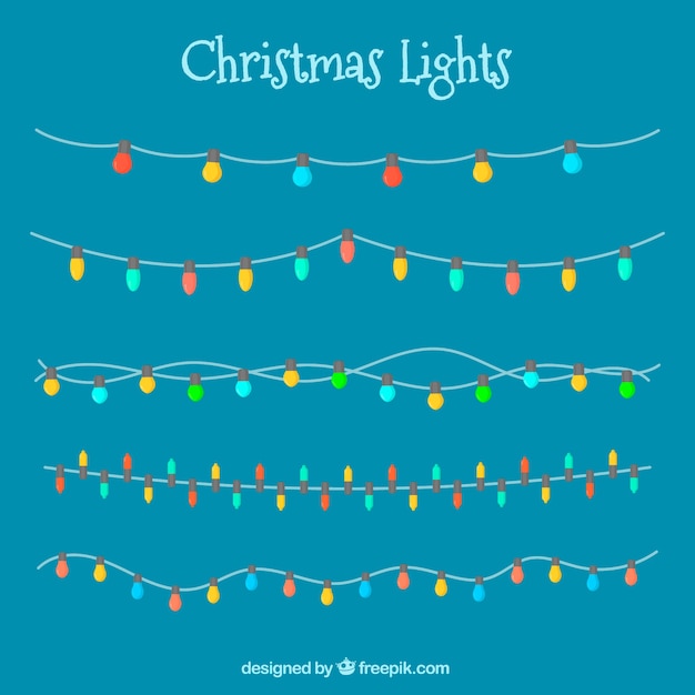 Colección de luces de navidad sobre fondo azul