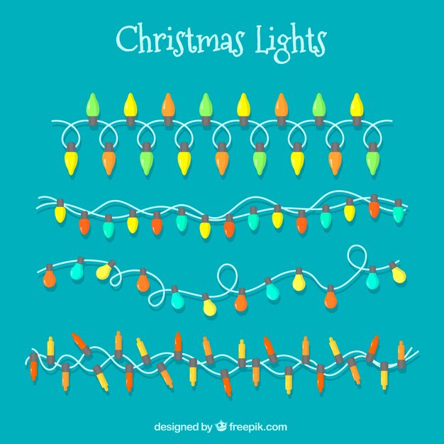 Colección de luces de navidad sobre fondo turquesa