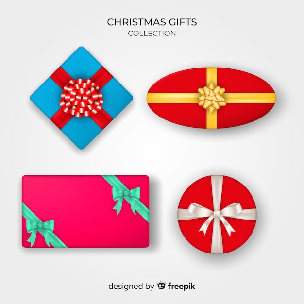 Vector gratuito colección realista de cajas de regalos de navidad