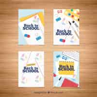 Vector gratuito colección de tarjetas de vuelta al colegio con diseño plano