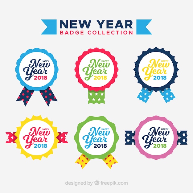 Coloridas insignias de año nuevo con cintas