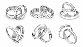 Vector gratuito conjunto de anillos de plata realistas de imágenes aisladas con anillos monocromáticos de lujo en pares en la ilustración de vector de fondo en blanco