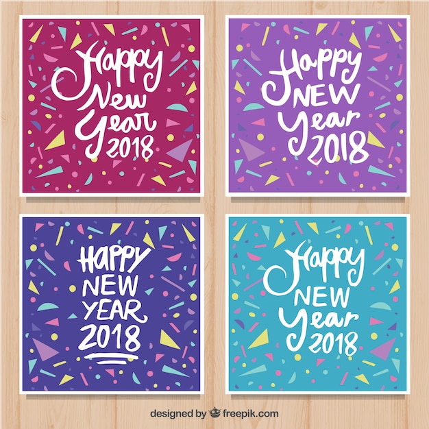 Vector gratuito conjunto de coloridas tarjetas cuadradas de año nuevo