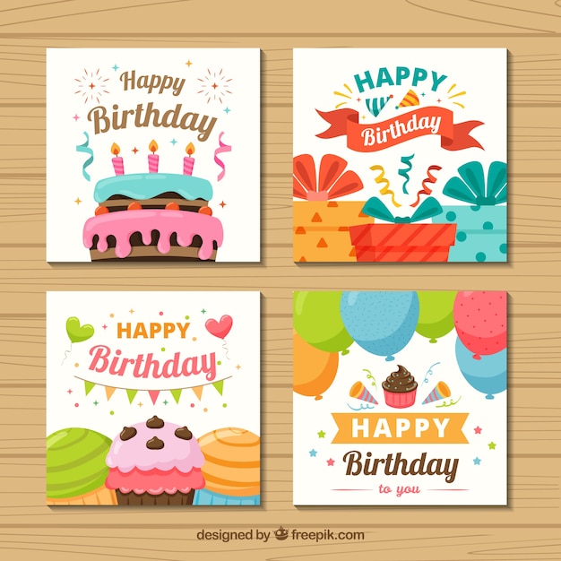 Conjunto de cuatro tarjetas de cumpleaños coloridas en diseño plano