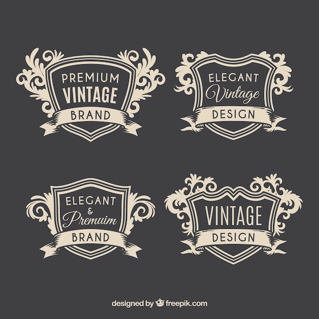Vector gratuito conjunto elegante de insignias vintage