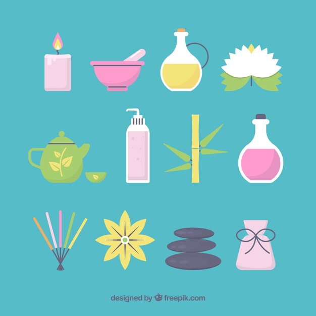 Conjunto de elementos de centro de spa con velas y aceites aromáticos