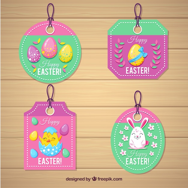 Vector gratuito conjunto de etiquetas de día de pascua con huevos y lindos animales