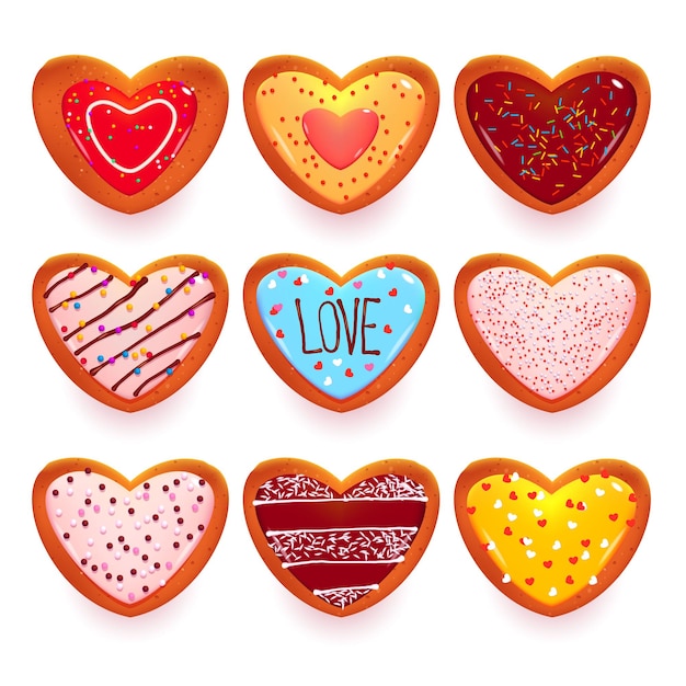 Vector gratuito conjunto de galletas de jengibre en forma de dulces de dibujos animados de corazón para el día de san valentín aislado en blanco.