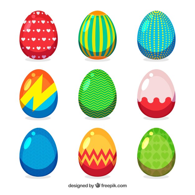 Vector gratuito conjunto de huevos de pascua en diferentes colores