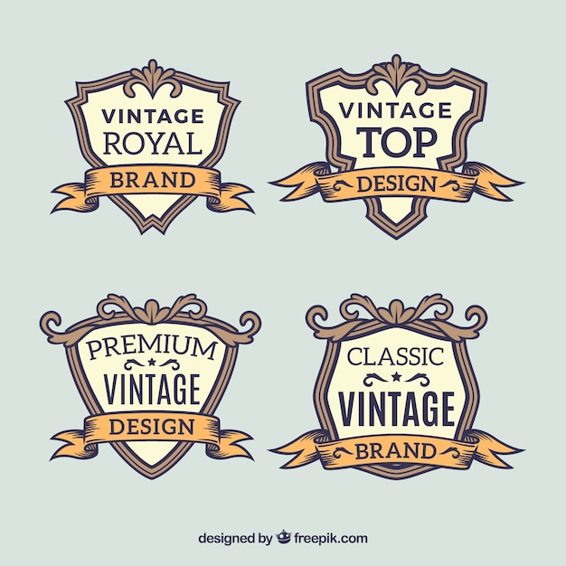 Vector gratuito conjunto de insignias vintage dibujadas a mano