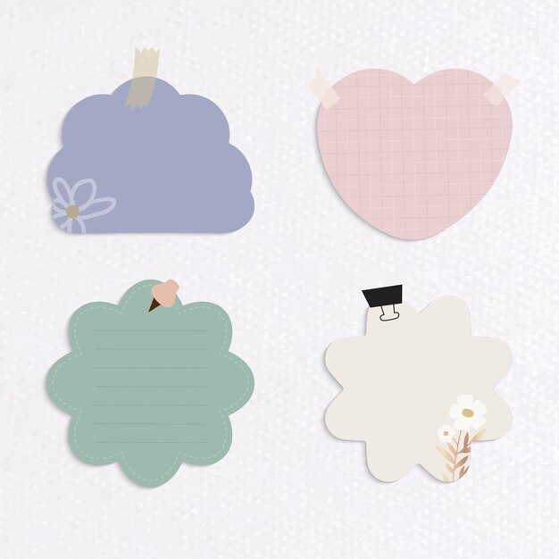 Conjunto de notas recordatorias de diferentes formas y colores sobre fondo de papel con textura