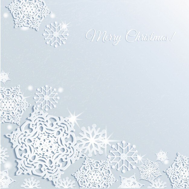 Copos de nieve brillantes sobre un fondo gris