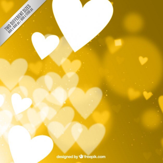 Corazones sobre fondo dorado