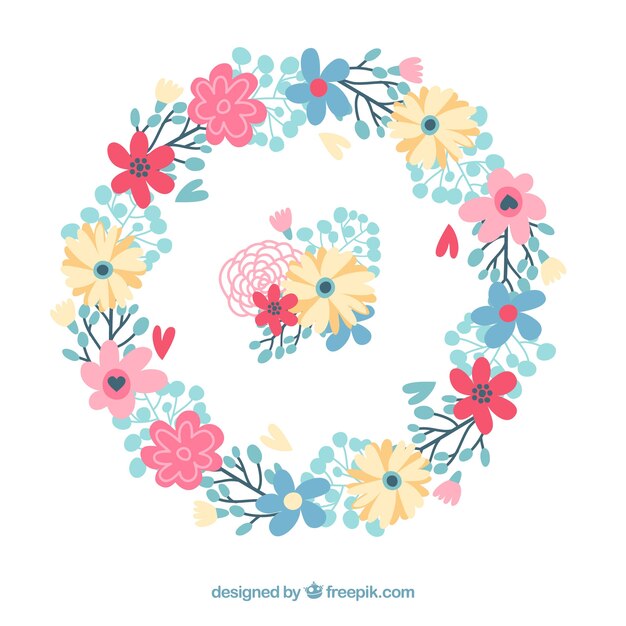 Corona de flores con hojas dibujadas a mano 