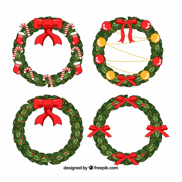 Coronas de navidad dibujadas a mano decoradas con lazos rojos