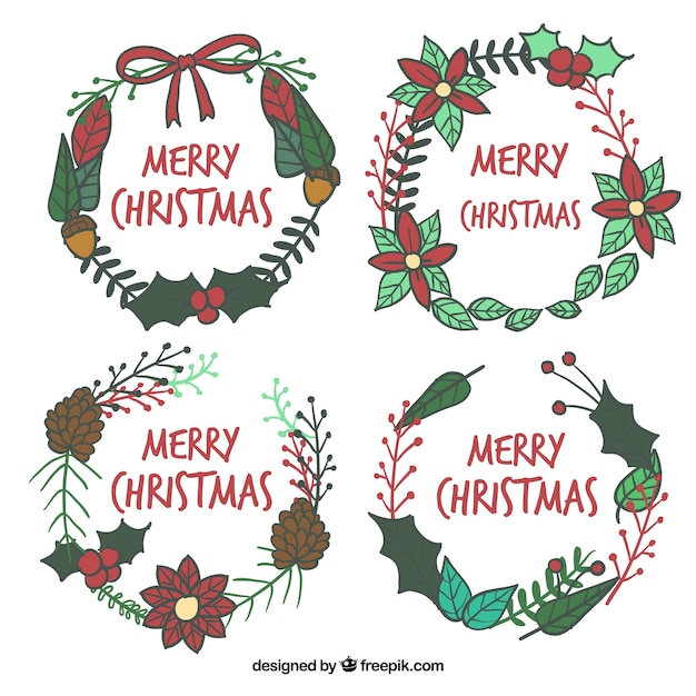 Coronas navideñas dibujadas a mano con texto de feliz navidad
