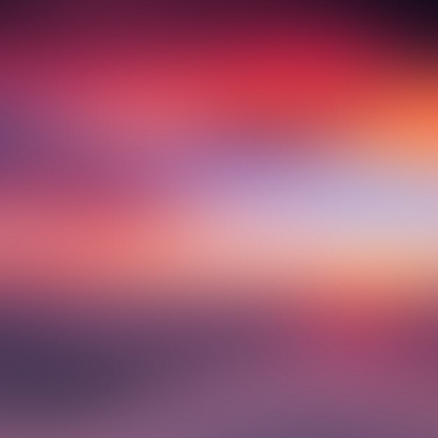 Vector gratuito desdibujado en tonos rojos de fondo