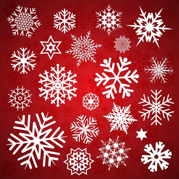 Vector gratuito diferentes copos de nieve sobre un fondo rojo