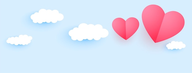 Vector gratuito diseño de banner de corazones y nubes de estilo de papel de san valentín