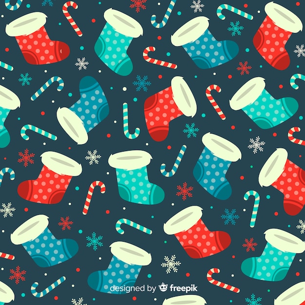 Diseño plano fondo de navidad con caramelos