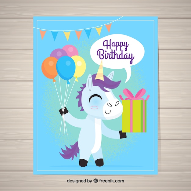 Vector gratuito divertida tarjeta de cumpleaños con un unicornio feliz