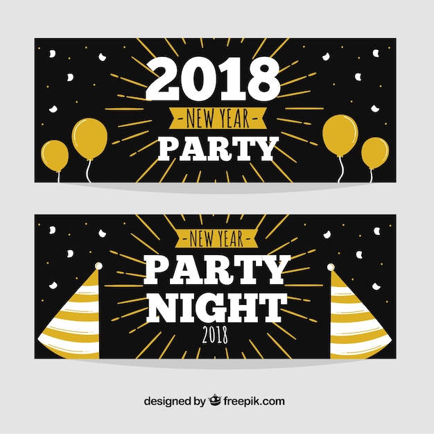 Vector gratuito dos banners de fiesta de año nuevo en negro dibujados a mano