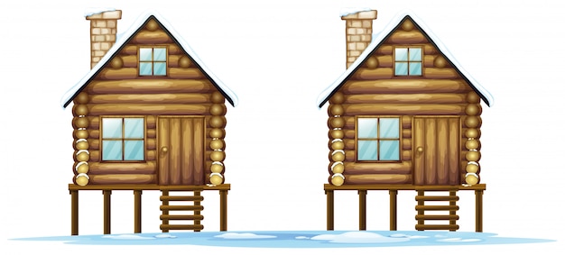 Dos cabañas de madera en el campo.
