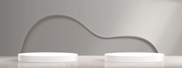 Dos podios circulares blancos con una pared gris curva
