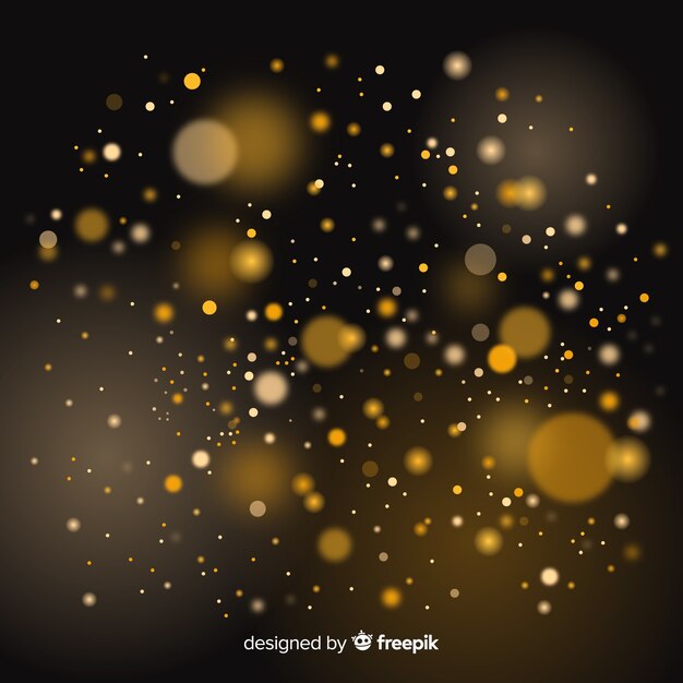 Efecto bokeh flotante de partículas doradas
